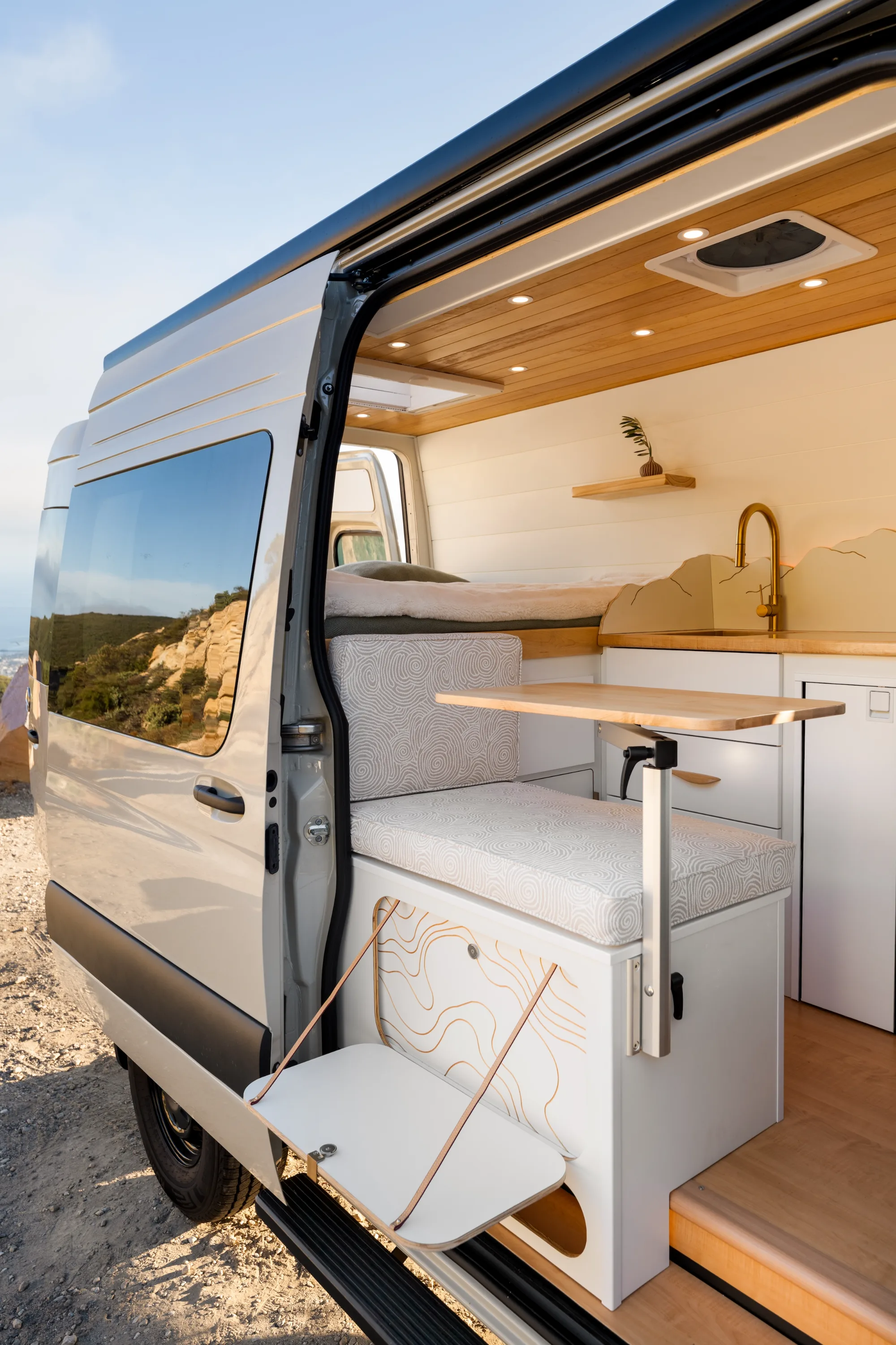 Sliding door open onto the dinette and kitchen