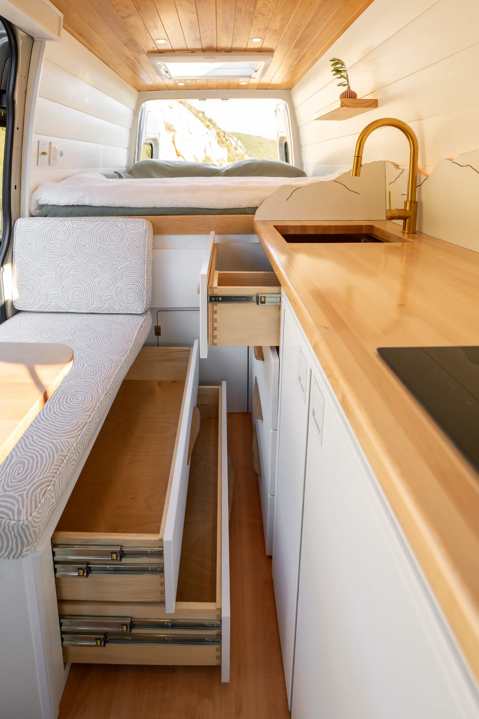 Drawers open beside the kitchen