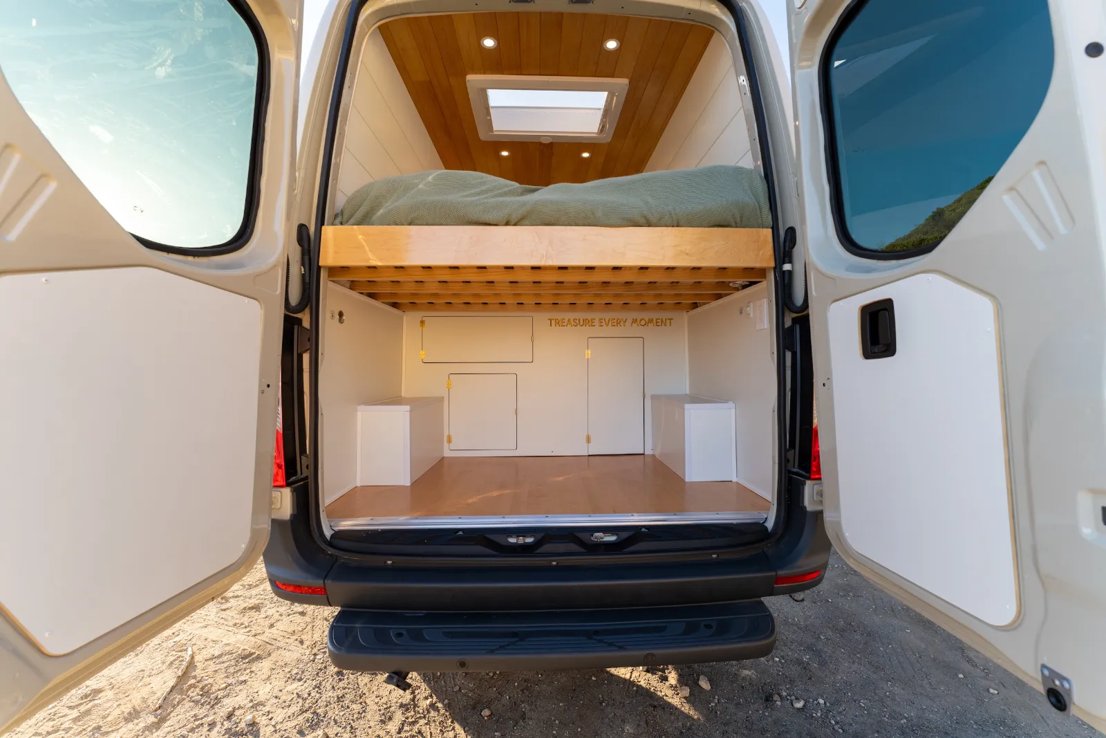 Rear doors open to the garage under the bed