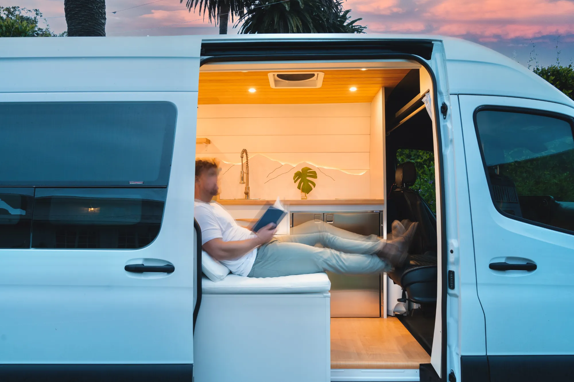Reading in the van at dusk