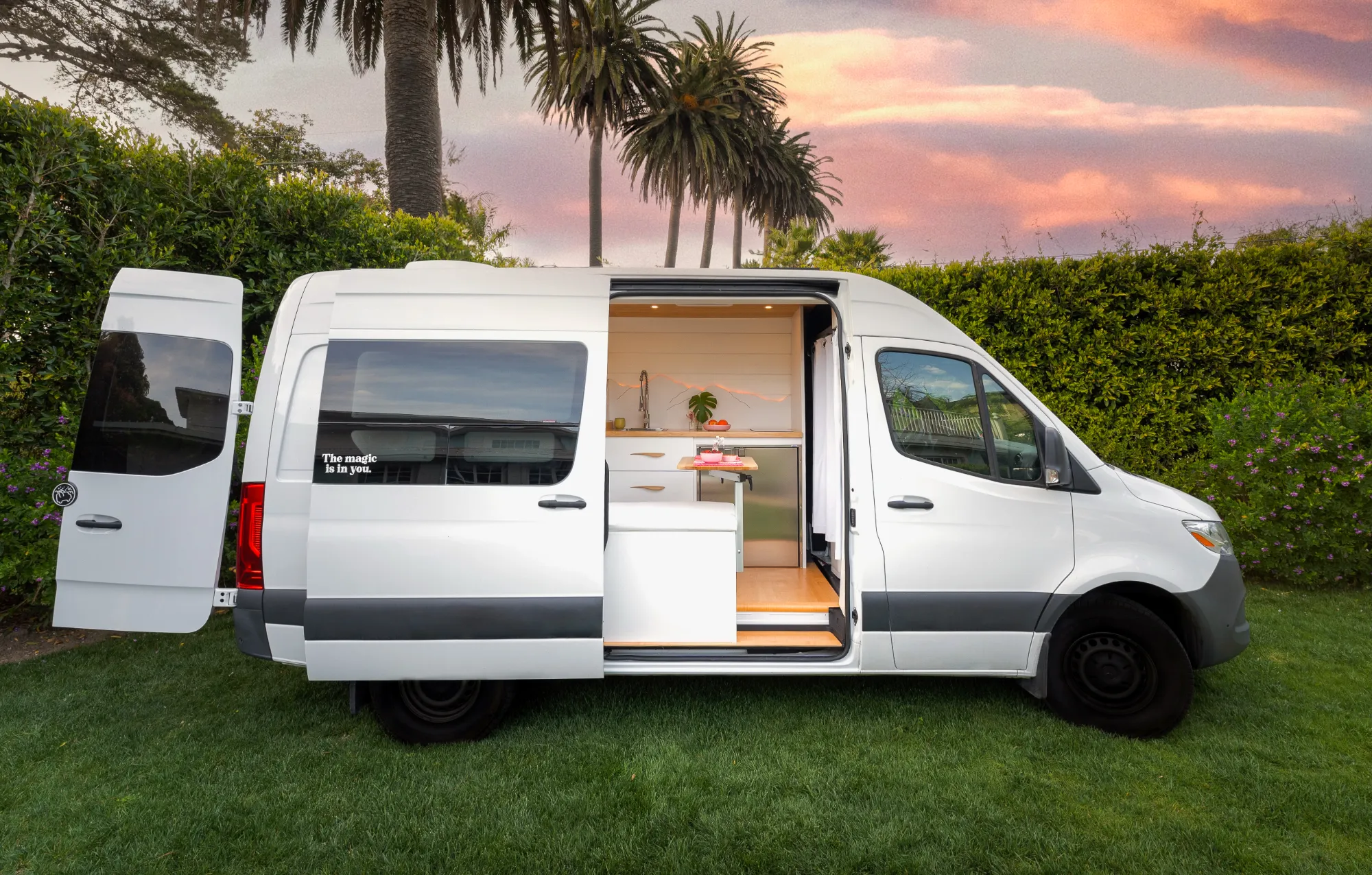 Van parked in a garden setting