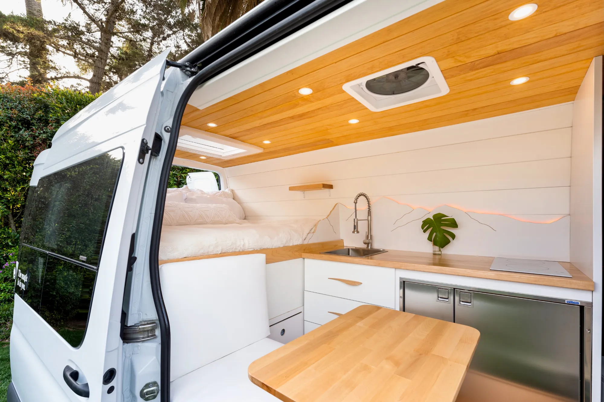 Full kitchen and dinette, doors open